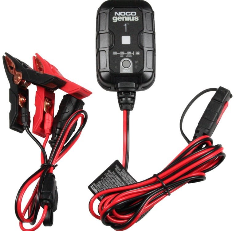 NOCO Genius 1 battery charger connected to a classic car battery